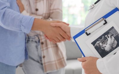 A couple talking to a Kingwood IVF specialist