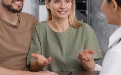 A couple talking to a the Woodlands IVF specialist